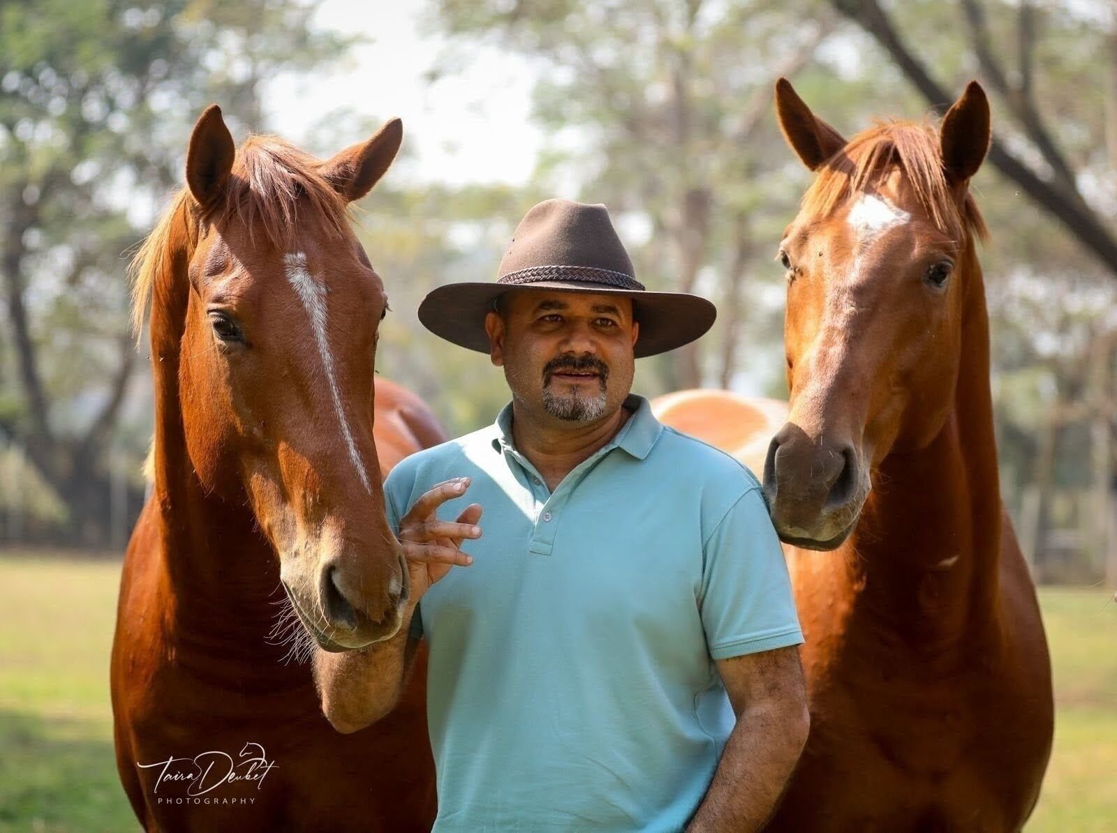 Gaurav Rampal with two Thoroughbreds